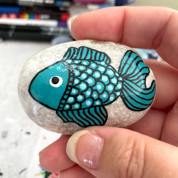 어항 물고기 바위: 예쁜 수조 꾸미기
(Eo-hang mulgogi bawi: yeppeun sujo kkumi-gi)

Translation: Aquarium fish rocks: Beautiful tank decorating